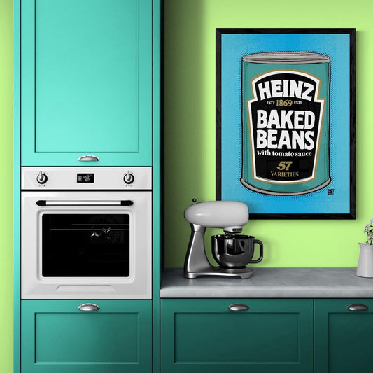 Kitchen with teal cabinets, white oven, and mixer, featuring framed Heinz baked beans artwork on a green wall.