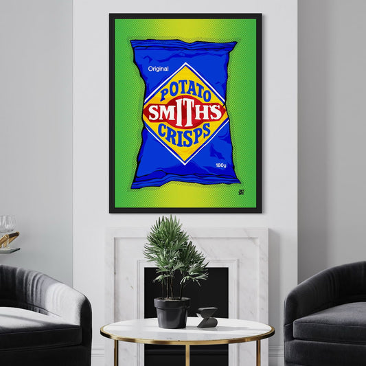 Framed artwork of a Smith's Crisps packet on a wall above a living room setup.