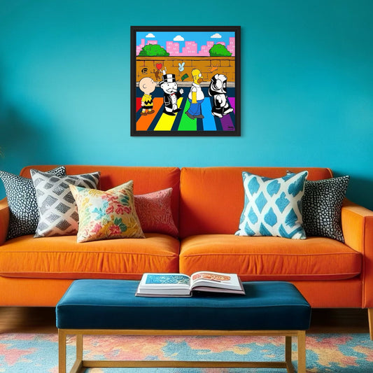 Colorful living room with an orange sofa, blue ottoman, and framed artwork on a turquoise wall.