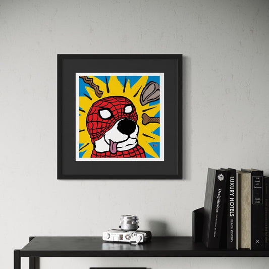 Framed artwork of a dog wearing a Spider-Man mask on a wall above a shelf with books and a camera.
