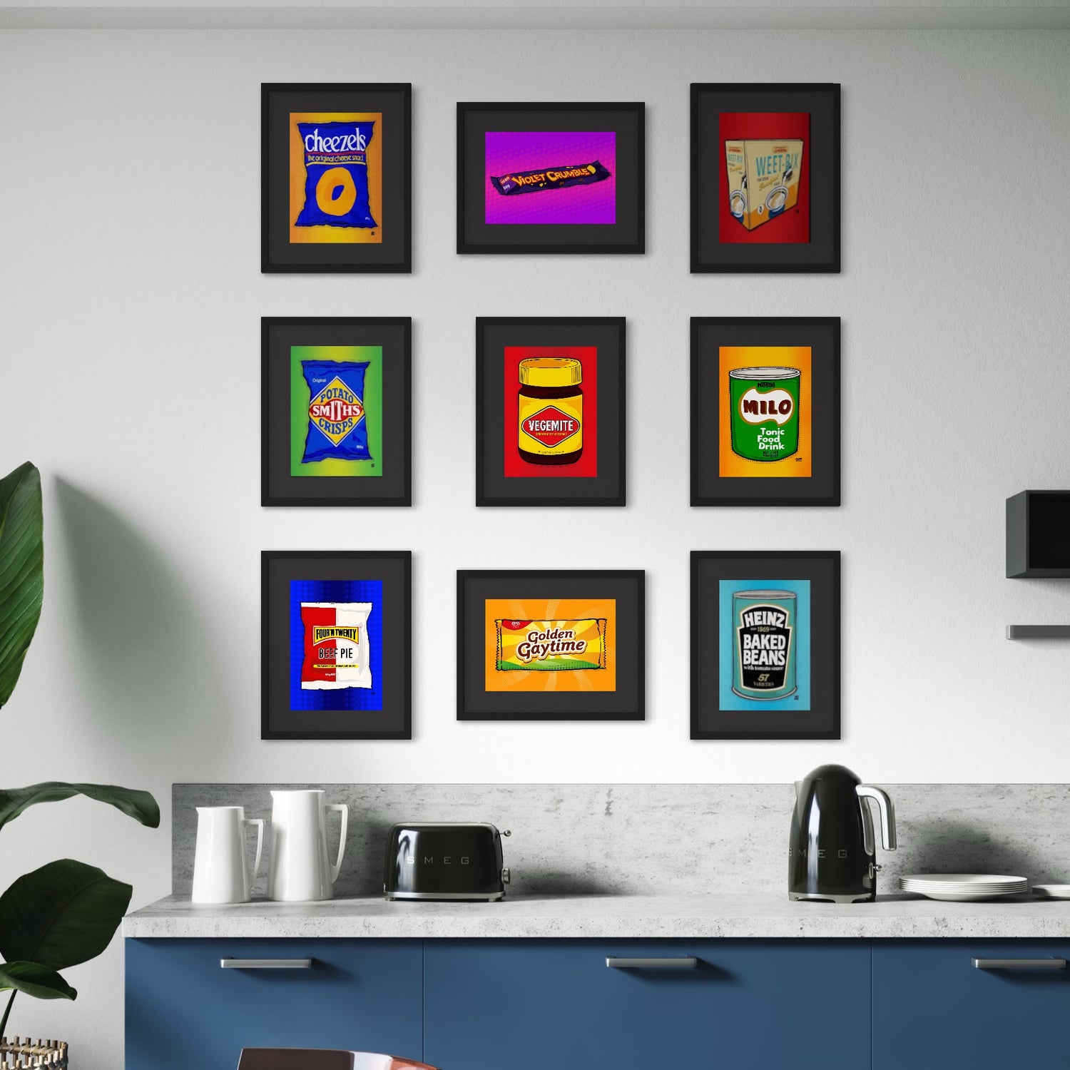 Framed vintage food packaging art on a kitchen wall