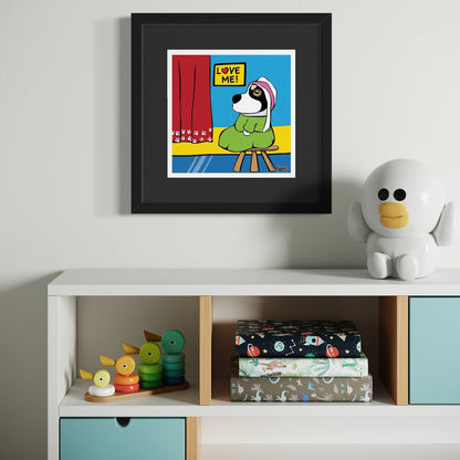 Dog in bonnet and green dress seated beside red curtain with paw prints—framed parody of Whistler’s Mother with ‘LOVE ME!’ sign overhead, staged above white cabinet with stacking toys, patterned boxes, and bird-like figurine. Giclée print, 18x18cm from Nessy Pop Art.