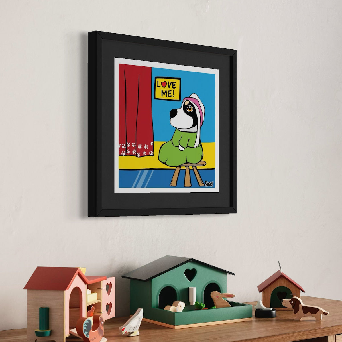 Dog in bonnet and green dress seated beside red curtain with paw prints— parody of Whistler’s Mother with ‘LOVE ME!’ sign overhead, staged above shelf of colorful house-shaped decor and animal figurines. Giclée print, 30x30cm from Nessy Pop Art