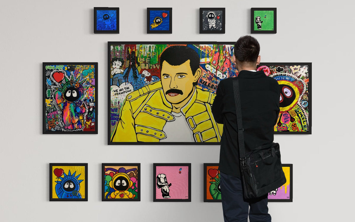 Person looking at colorful artwork on a wall