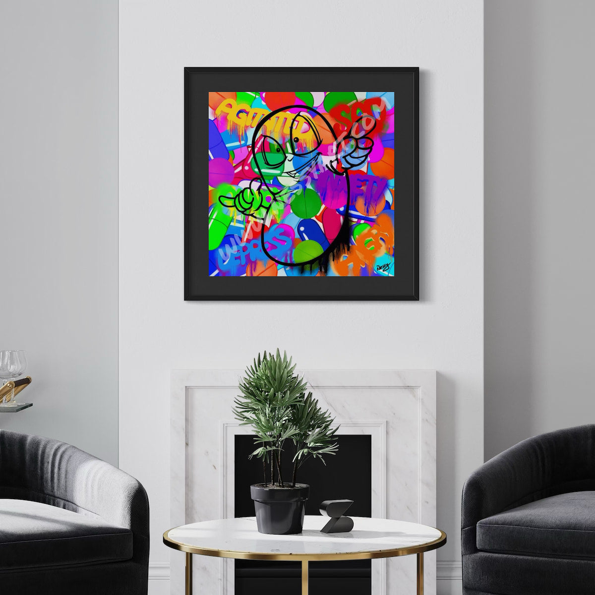 Framed colorful artwork of a pill character overcoming depression and anxiety, on a wall above a round table with a plant and two chairs.