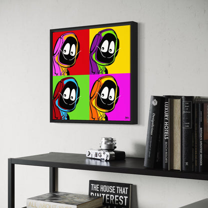 Framed colorful artwork of Hoodie Boy dressed as Salvadore Dali on a wall above a shelf with books and decor items.