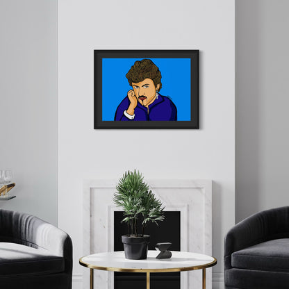 George Michael in deep blue, gaze turned and hand resting gently—quiet charisma framed in bold blue. A2 giclée from Nessy Pop Art, staged above a marble fireplace in a modern living room