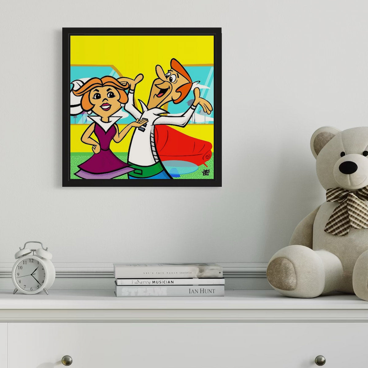 Framed cartoon artwork of a couple on a shelf with a teddy bear and books.