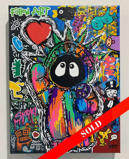 Colorful painting depicting Hoodie Boy as the Statue of Liberty with a heart balloon and peace symbol surrounded by iconic images.