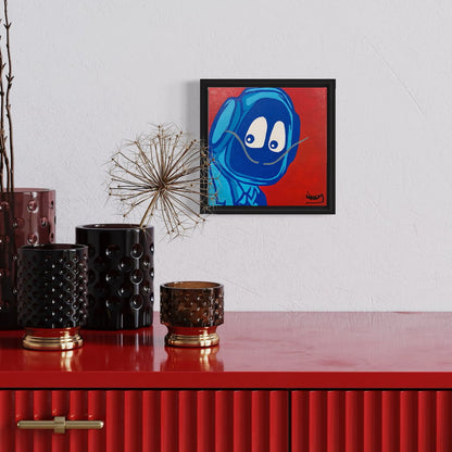 Framed painting of Hoodie Boy dressed as Salvadore Dali on a wall above a red surface with decorative vases.
